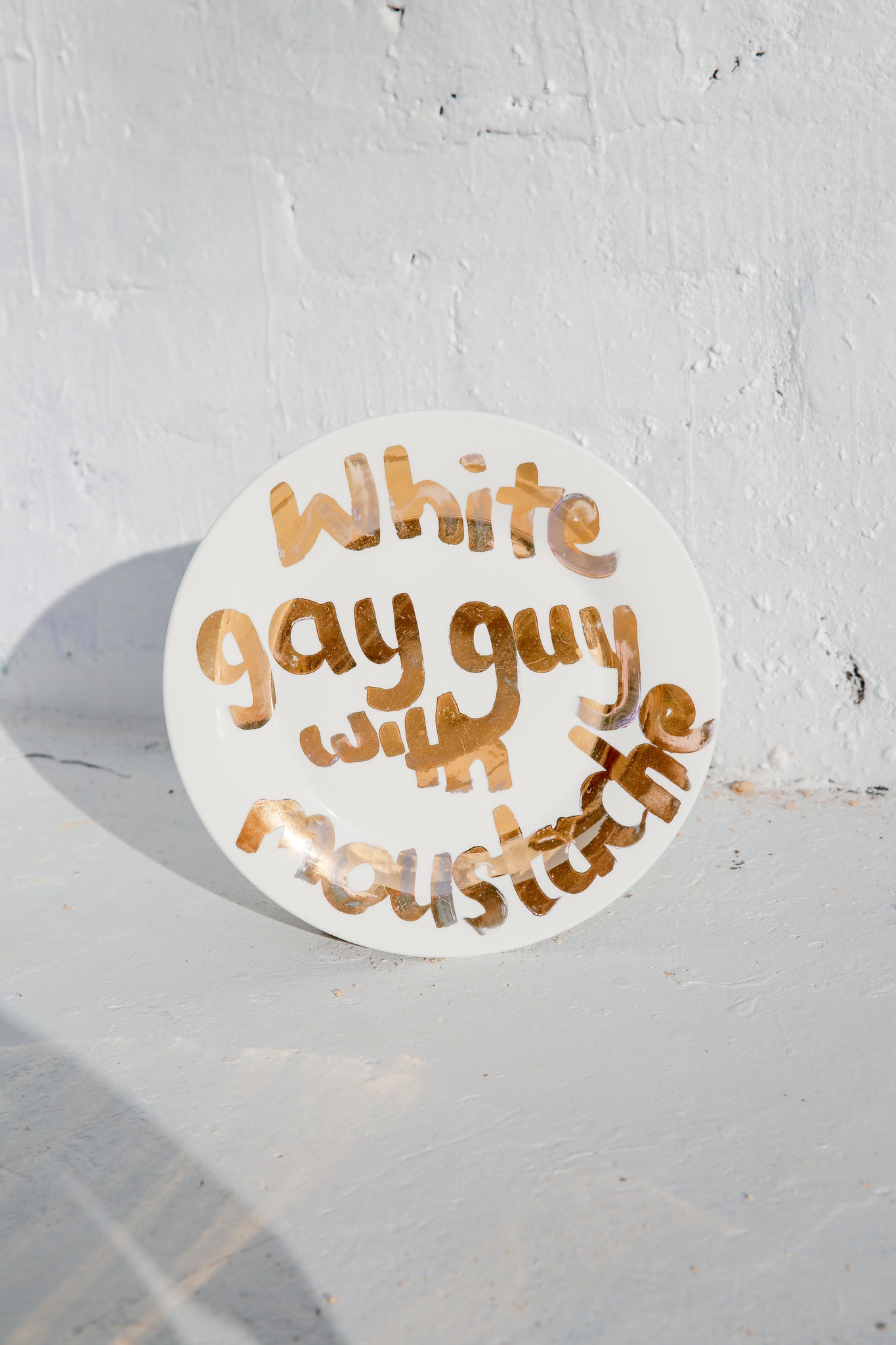 WHITE GAY GUY WITH A MOUSTACHE